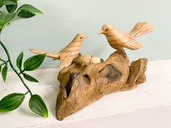 Wooden Double Bird with Eggs on Log