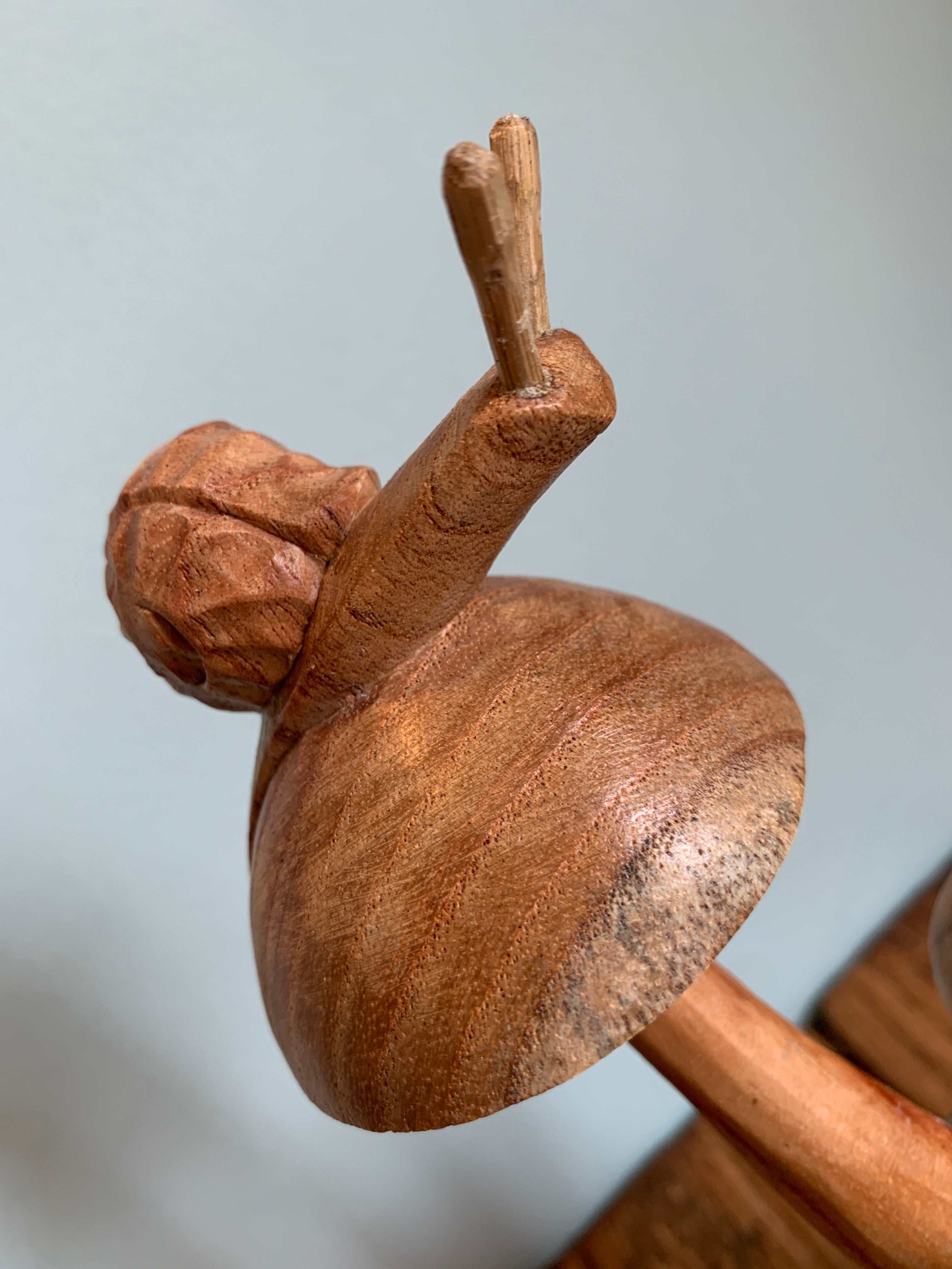 Wooden Snail on Three Mushrooms