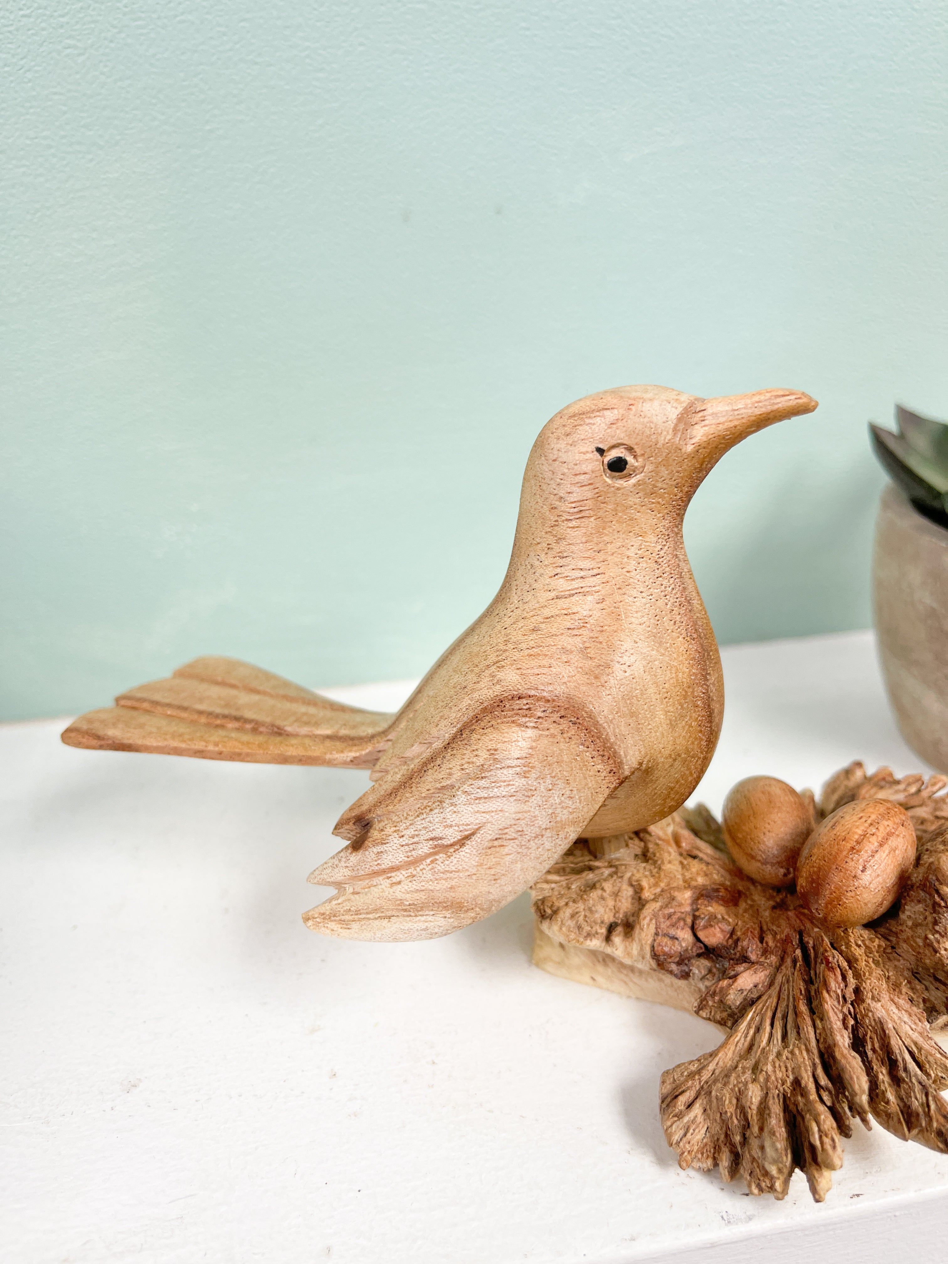 Wooden Bird Ornament on Parasite